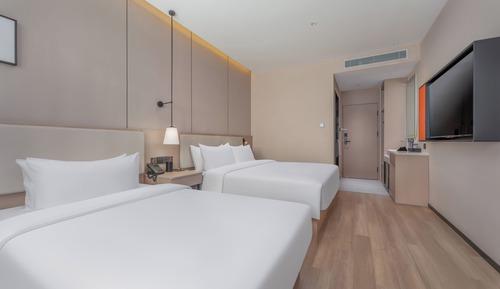 Habitación familiar con 2 camas individuales, vistas a la ciudad