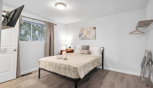 Habitación triple Confort, 1 cama de matrimonio, vistas al jardín