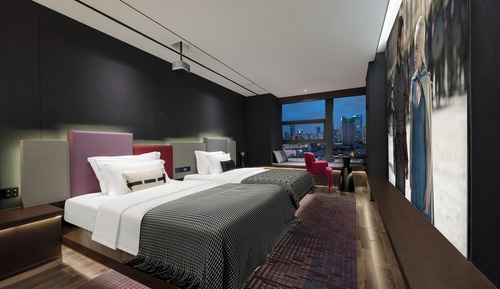 Habitación familiar con 1 cama doble o 2 individuales, vistas a la ciudad