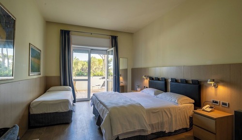 Habitación triple estándar (Vista Giardino)