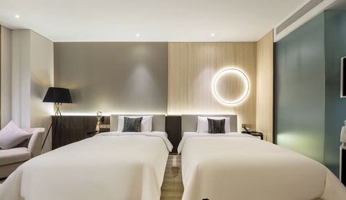Habitación Signature con 2 camas individuales
