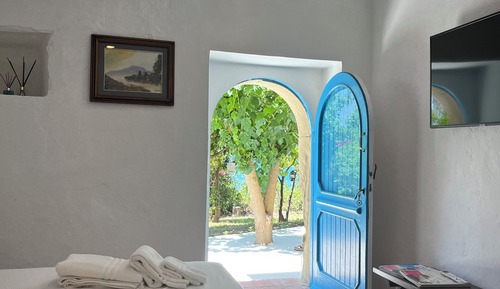 Habitación cuádruple de lujo, vistas al jardín