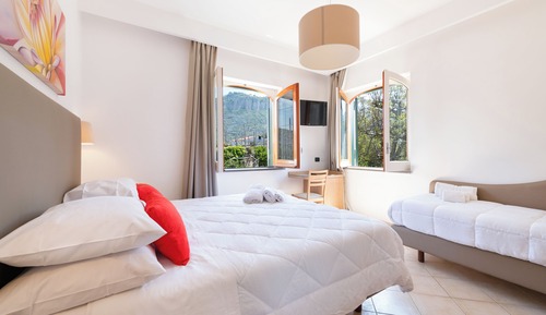 Habitación triple Confort, vistas al jardín