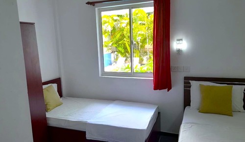 Habitación triple Deluxe