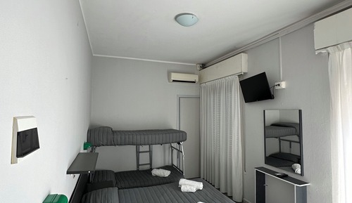 Habitación triple superior, balcón