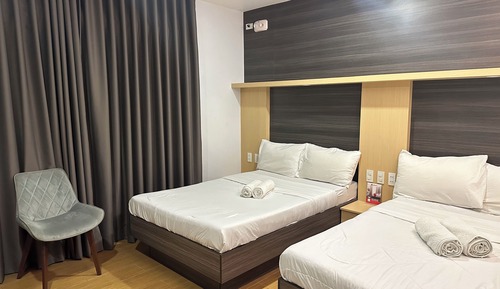Habitación cuádruple Deluxe, vistas a la ciudad