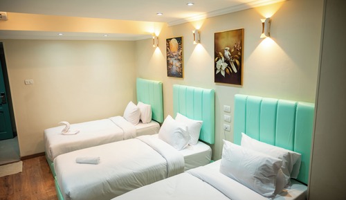 Habitación triple Deluxe