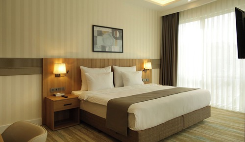 Habitación triple Deluxe, 1 cama de matrimonio grande con sofá cama, no fumadores, baño privado