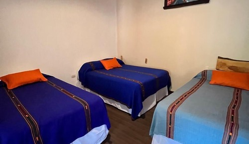 Habitación triple Deluxe