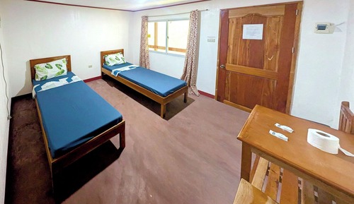 Habitación con 2 camas individuales