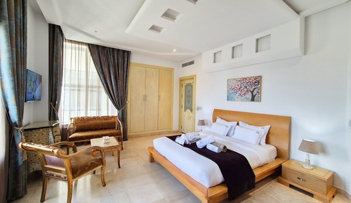 Suite presidencial, 1 cama de matrimonio grande, acceso a la piscina, vistas al lago