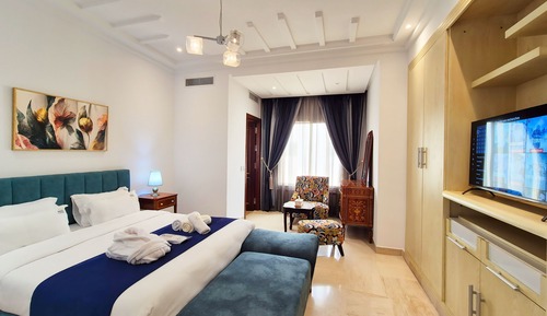 Suite Signature, 1 cama de matrimonio grande, acceso a la piscina, vistas al jardín