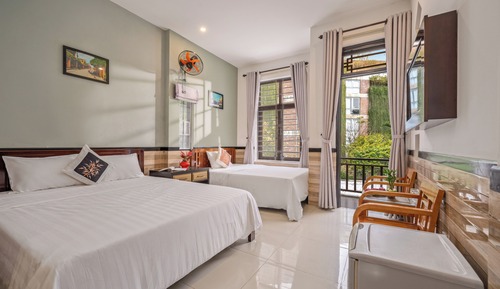 Habitación triple Deluxe, balcón, vistas al jardín