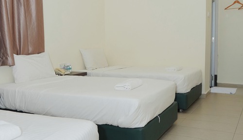 Habitación triple Deluxe