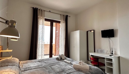 Habitación triple superior, vistas a la ciudad