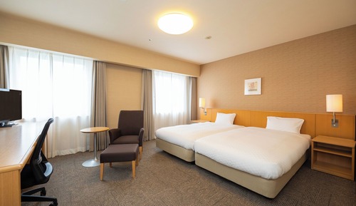 Habitación superior con 2 camas individuales, vistas a la ciudad