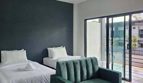 Habitación estándar con 2 camas individuales, balcón, vistas al jardín