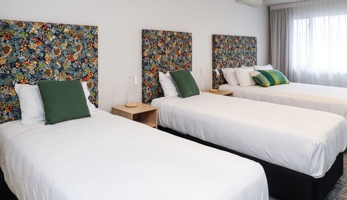Habitación cuádruple superior, varias camas
