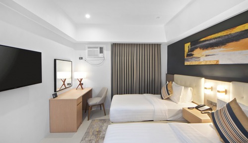 Habitación estándar con 1 cama doble o 2 individuales