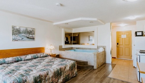 Suite, 1 cama de matrimonio grande, cocina básica