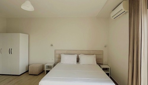 Habitación triple, vistas al mar