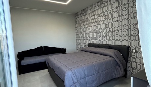 Habitación triple superior, vistas al jardín