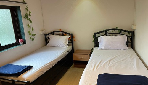 Habitación superior, vistas al jardín