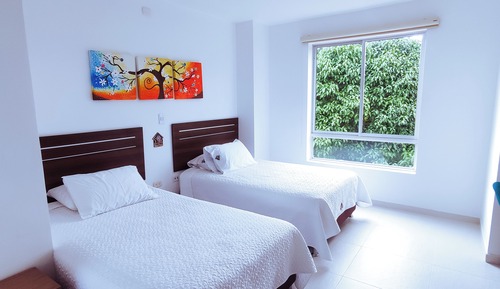 Habitación con 2 camas individuales