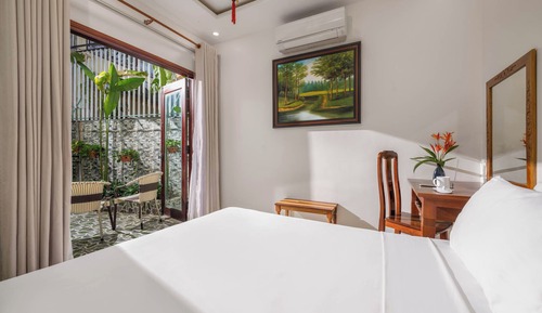 Habitación cuádruple familiar, vistas al jardín