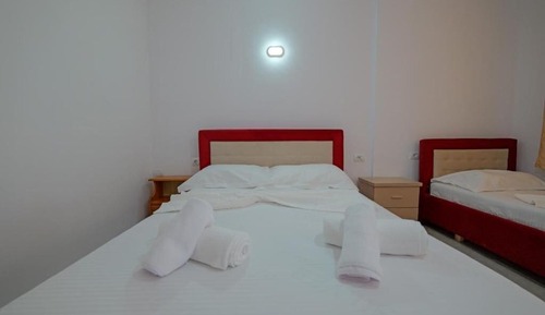 Habitación triple, vistas al mar