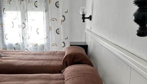 Habitación Deluxe con 2 camas individuales, balcón, vistas a la ciudad