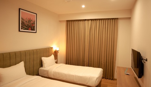 Habitación ejecutiva con 1 cama doble o 2 individuales, vistas a la ciudad