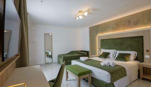 Habitación triple Deluxe