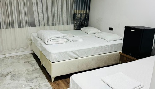 Habitación cuádruple, vistas a la ciudad