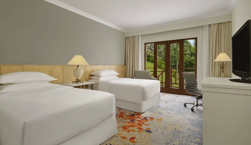 Habitación Deluxe con 2 camas individuales, balcón, vistas al jardín