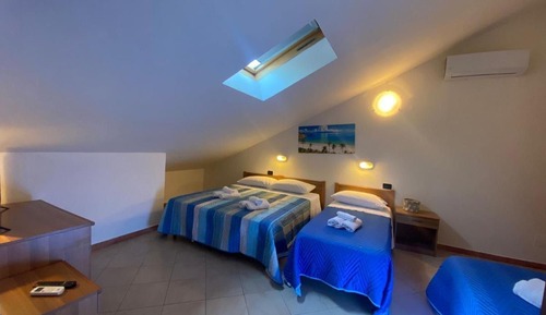 Habitación cuádruple Deluxe