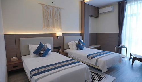 Habitación Deluxe con 1 cama doble o 2 individuales, vistas al patio