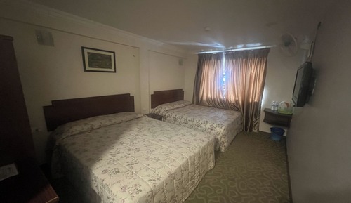 Habitación cuádruple Deluxe