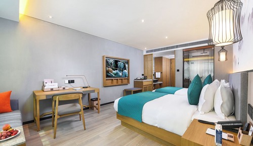 Habitación superior con 2 camas individuales, vistas a la ciudad