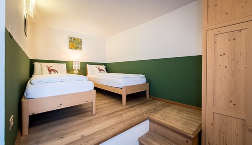Habitación superior con 1 cama doble o 2 individuales