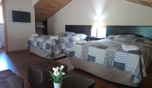 Habitación cuádruple familiar, vistas al jardín
