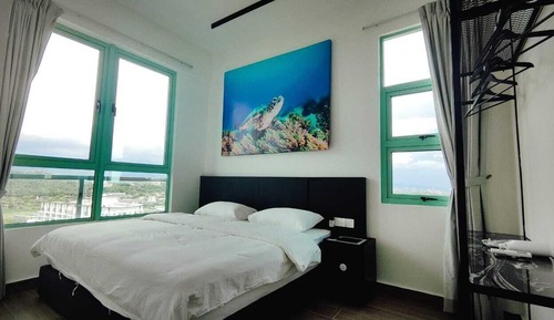 Suite Deluxe, varias camas, balcón, vistas al mar