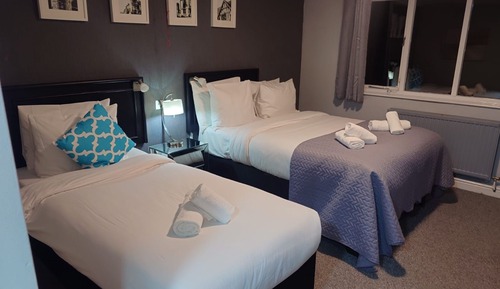Habitación triple, varias camas (UA Wet)