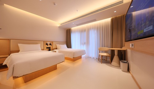 Habitación de diseño con 2 camas individuales