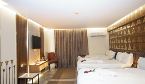 Habitación cuádruple Deluxe