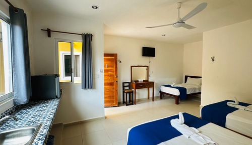 Habitación triple Confort, vistas al jardín