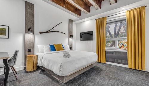 Suite estudio, 1 cama de matrimonio grande, cocina básica