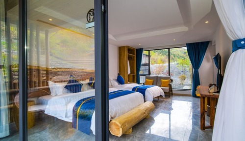 Habitación familiar con 2 camas individuales, vistas al jardín