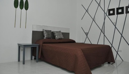 Habitación cuádruple Deluxe, vistas a la ciudad