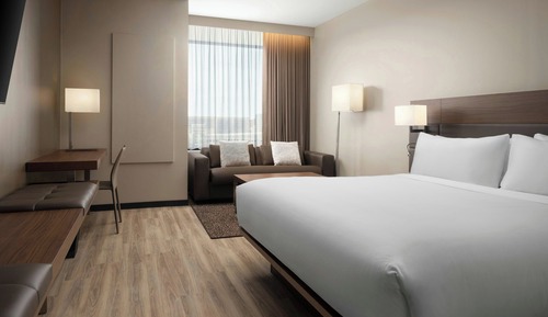 Habitación Deluxe, 1 cama de matrimonio grande con sofá cama, vistas a la ciudad